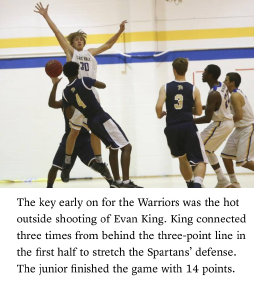 Evan King #30 East Wake Warriors defending against Knightdale